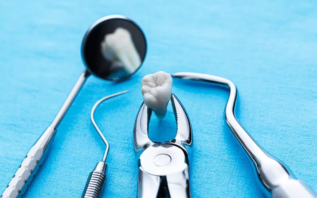 как остановить кровь после удаления зуба