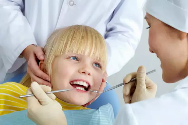 Лечение черного налета на зубах у детей в клинике Эскулап